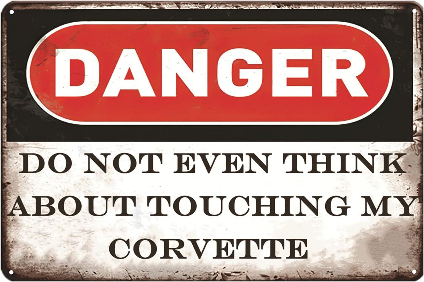 Garage Signs Showdown: Vintage Corvette Charm vs. Modern Edge
